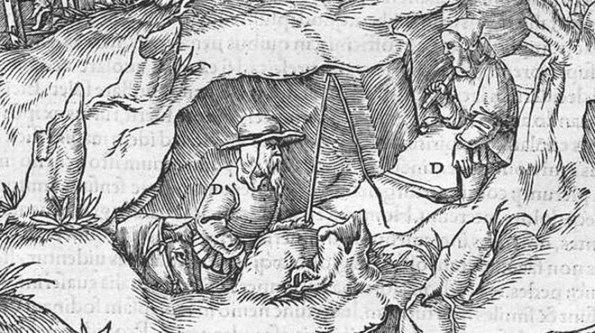 Retrat our da l'Illustraziun istorica da G. Agricola da minadurs in foss e gallarias, De re metallica, libri XII, Basilea   1556. fotografia: mad