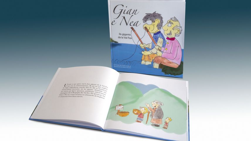 «Gian e Nea», ein romanisches Kinderbuch mit deutscher Übersetzung, handelt von zwei Riesen, die vor hundert Jahren im Engadin gelebt haben. 	
Foto: Daniel Zaugg