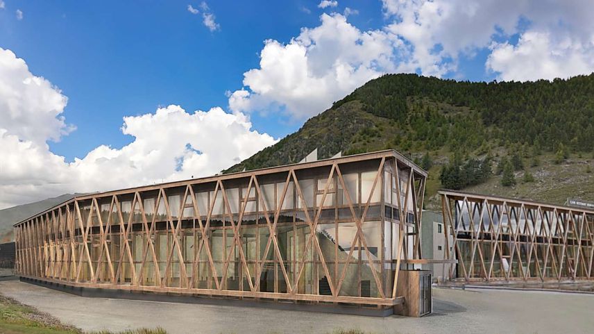 Eine Visualisierung des neuen Gewerbehauses in S-chanf. Im Hintergrund der Serlas Parc. Visualisierung: Renato Maurizio AG