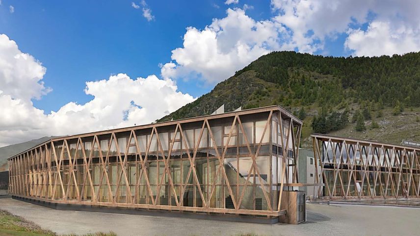 Eine Visualisierung des neuen Gewerbehauses in S-chanf. Im Hintergrund der Serlas Parc. Visualisierung: Renato Maurizio AG